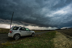 Dramatic and dark storm clouds gathering over the rural landscape near Maryville, Missouri, during the severe weather event of April 3, 2026. Extreme weather photography by storm chaser Mauro Greco