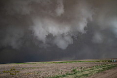 ornado-warned supercell structure and rapidly spreading wildfire near Gove City, Kansas - June 20, 2026