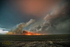 ornado-warned supercell structure and rapidly spreading wildfire near Gove City, Kansas - June 20, 2026