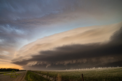 ornado-warned supercell structure and rapidly spreading wildfire near Gove City, Kansas - June 20, 2026