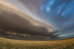 ornado-warned supercell structure and rapidly spreading wildfire near Gove City, Kansas - June 20, 2026