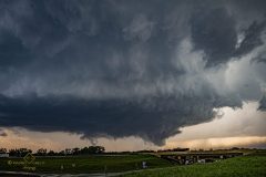 A massive, rapidly rotating wall cloud and ominous severe supercell thunderstorm dominate the sky over the plains near Braman, Oklahoma, on April 23, 2026. This intense atmospheric structure and mesocyclone preceded a dangerous rain-wrapped tornado. Extreme weather photography and storm chasing by Mauro Greco.