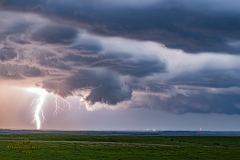 Rare nocturnal tornado illuminated by lightning south of Emporia, Kansas - May 31, 2026