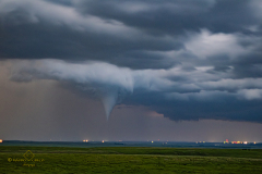 Rare nocturnal tornado illuminated by lightning south of Emporia, Kansas - May 31, 2026