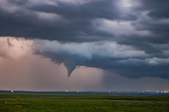 Rare nocturnal tornado illuminated by lightning south of Emporia, Kansas - May 31, 2026